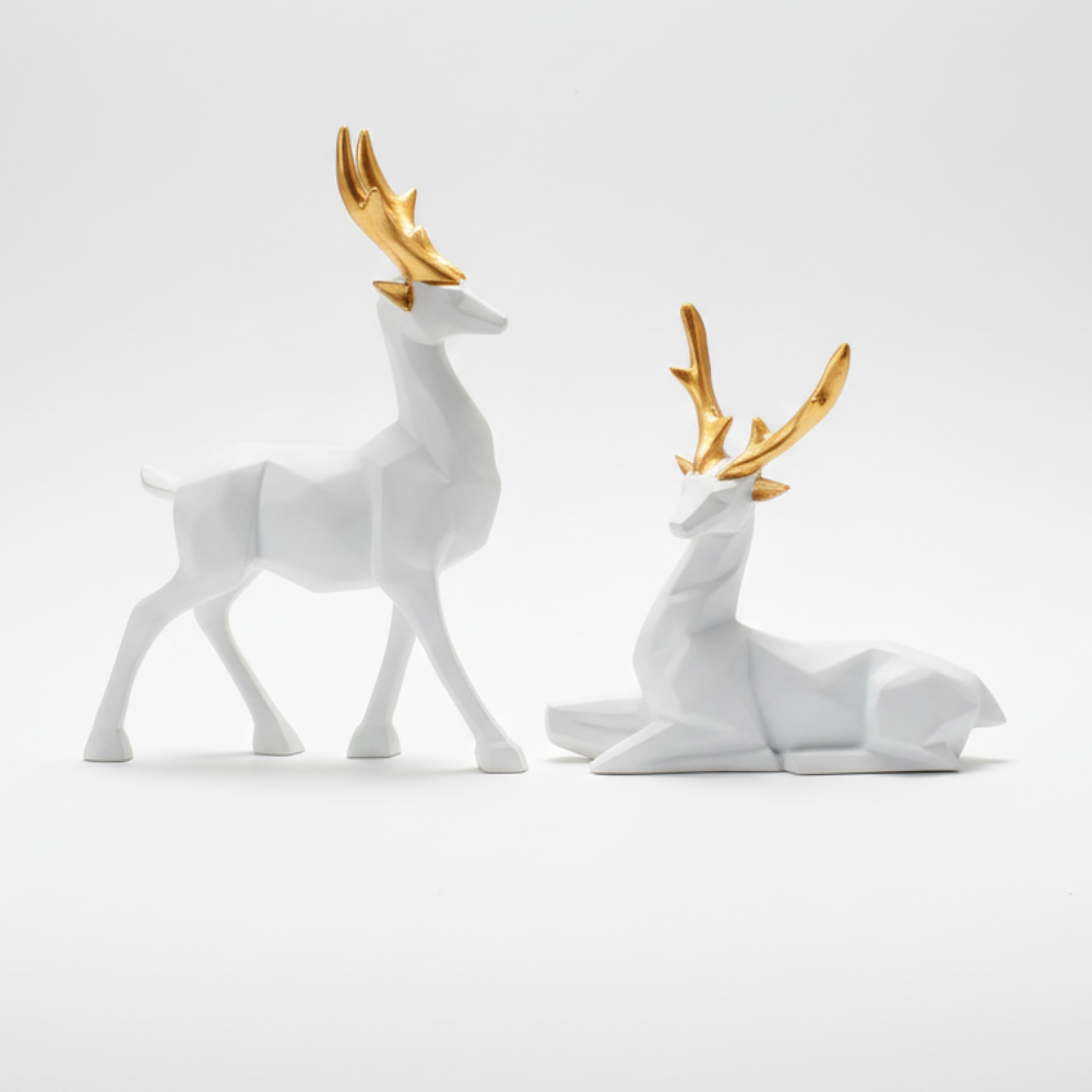 Elegant White Deer Sculptures with Gold Antlers