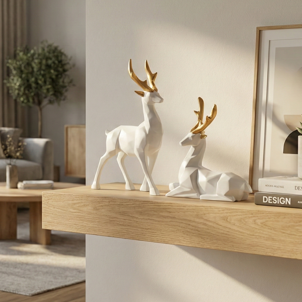 Elegant White Deer Sculptures with Gold Antlers